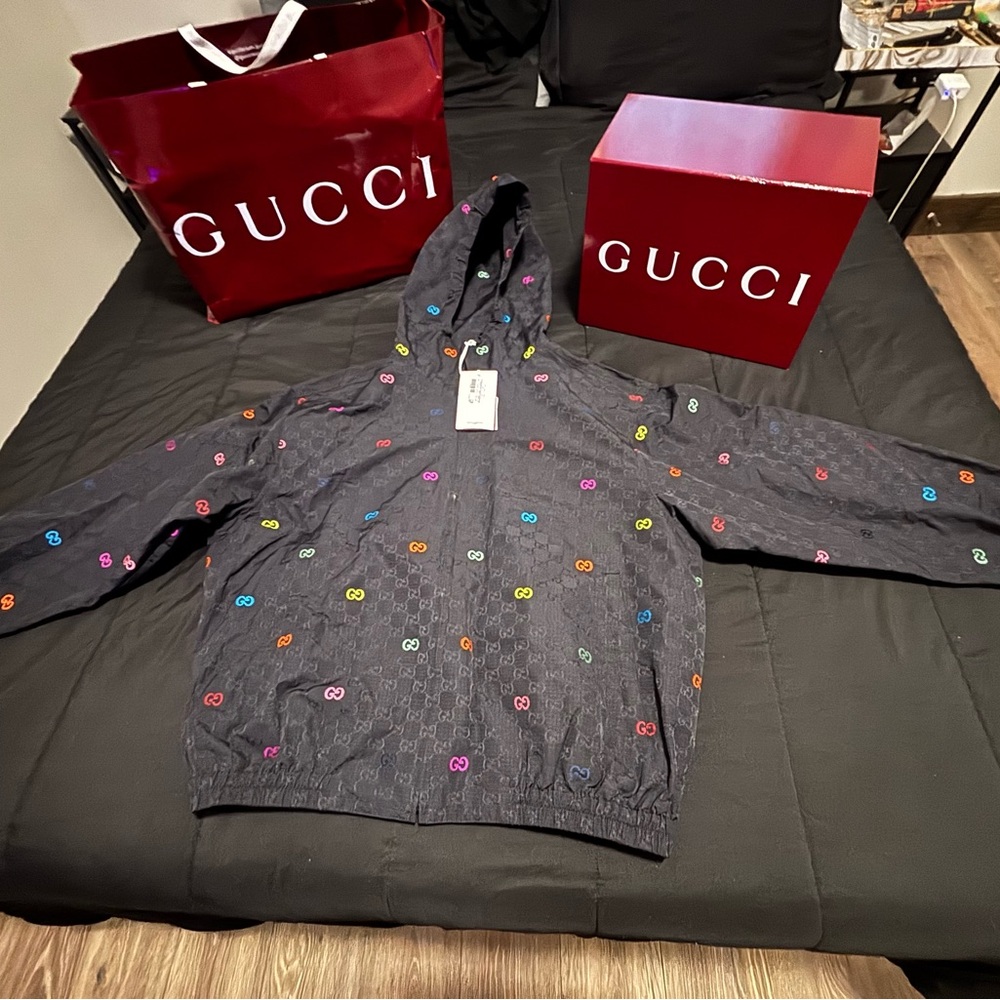Gucci Black Jacket with Multicolor Logo
Authentic - Picture 1 of 3